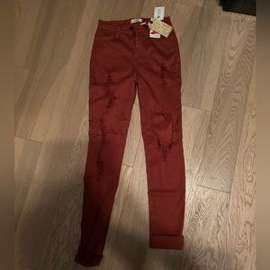 Burnt orange ripped denim